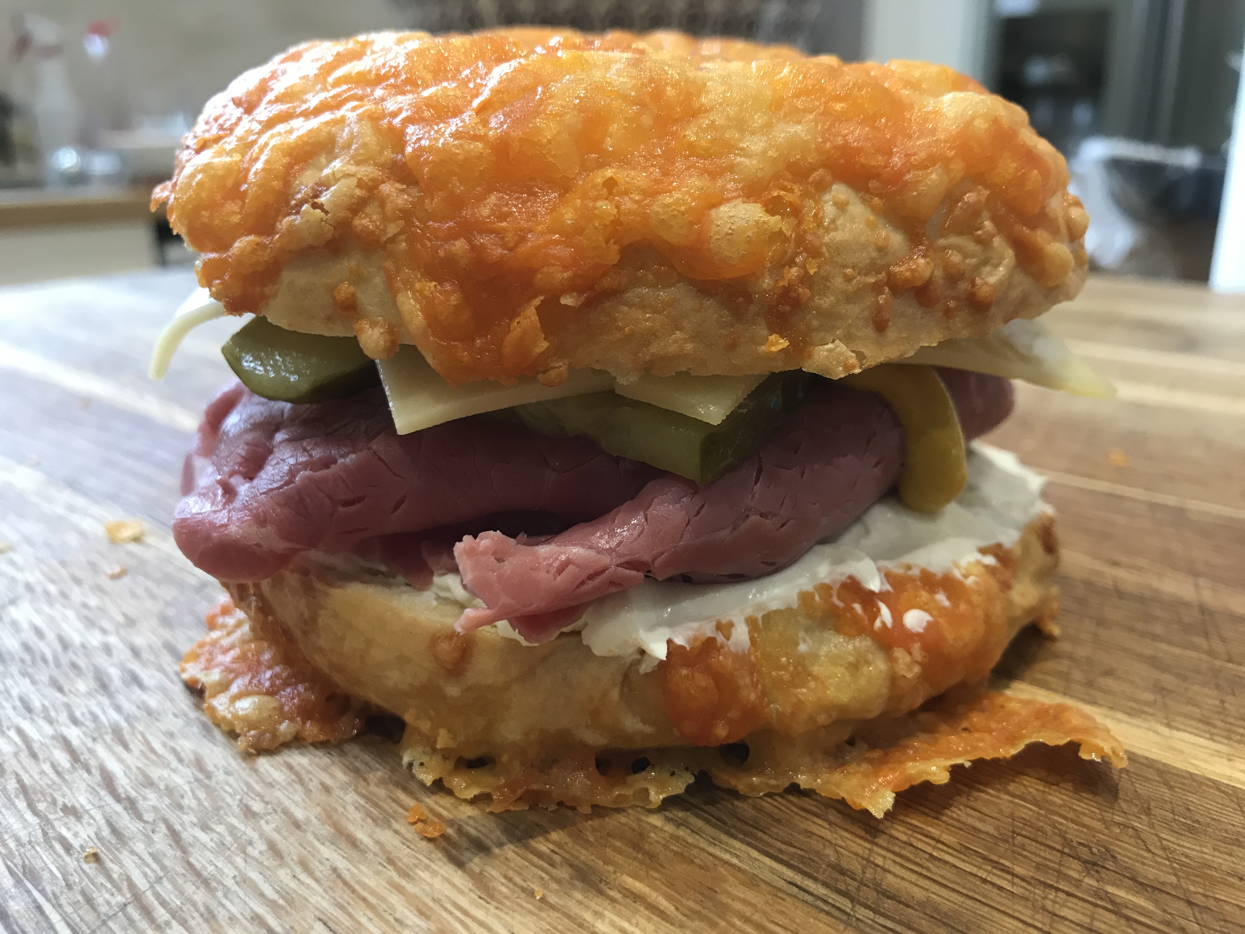 Salt Beef Bagel With Cheddar cheese, Red Leicester and onion